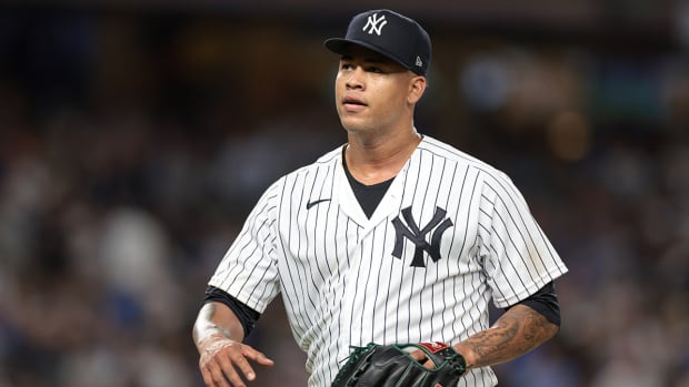 New York Yankees starting pitcher Frankie Montas (47) walks off the field after being relieved during the sixth inning against the New York Mets at Yankee Stadium.